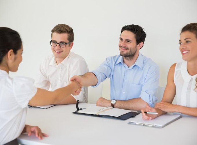 People Shaking Hands During Job Interview — Document Management in Australia
