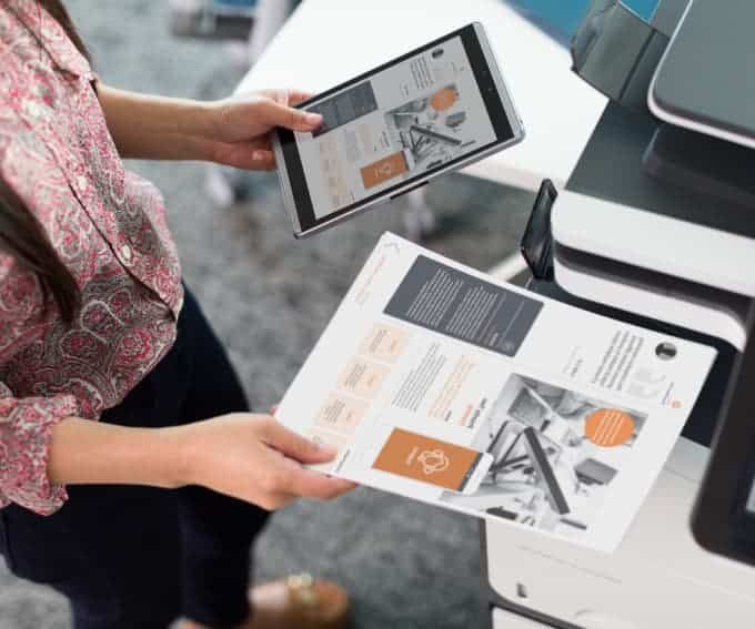 Lady working on printing files — Document Management in Australia